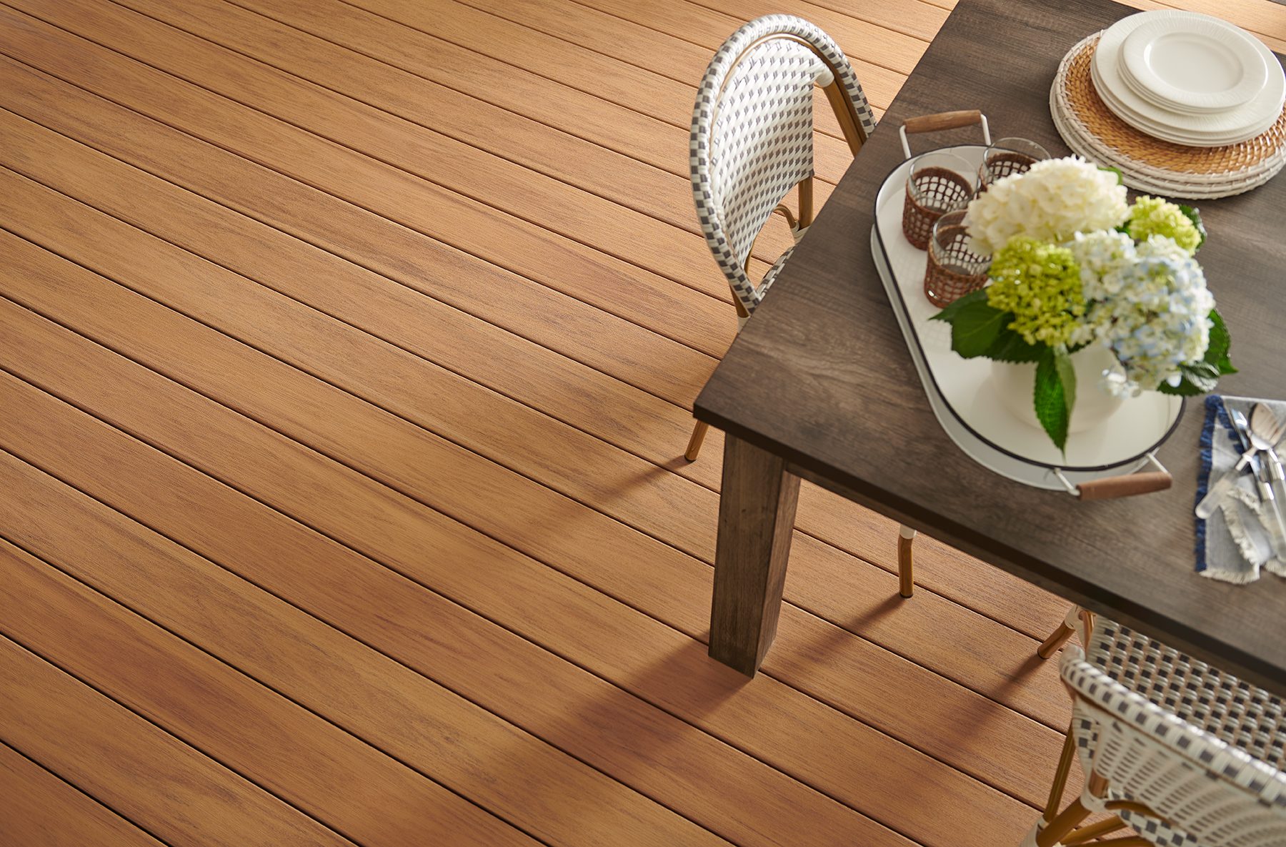 https://www.wolfhomeproducts.com/wp-content/uploads/2023/06/Wolf-Exterior_Overhead-Decking-Dinning.jpg